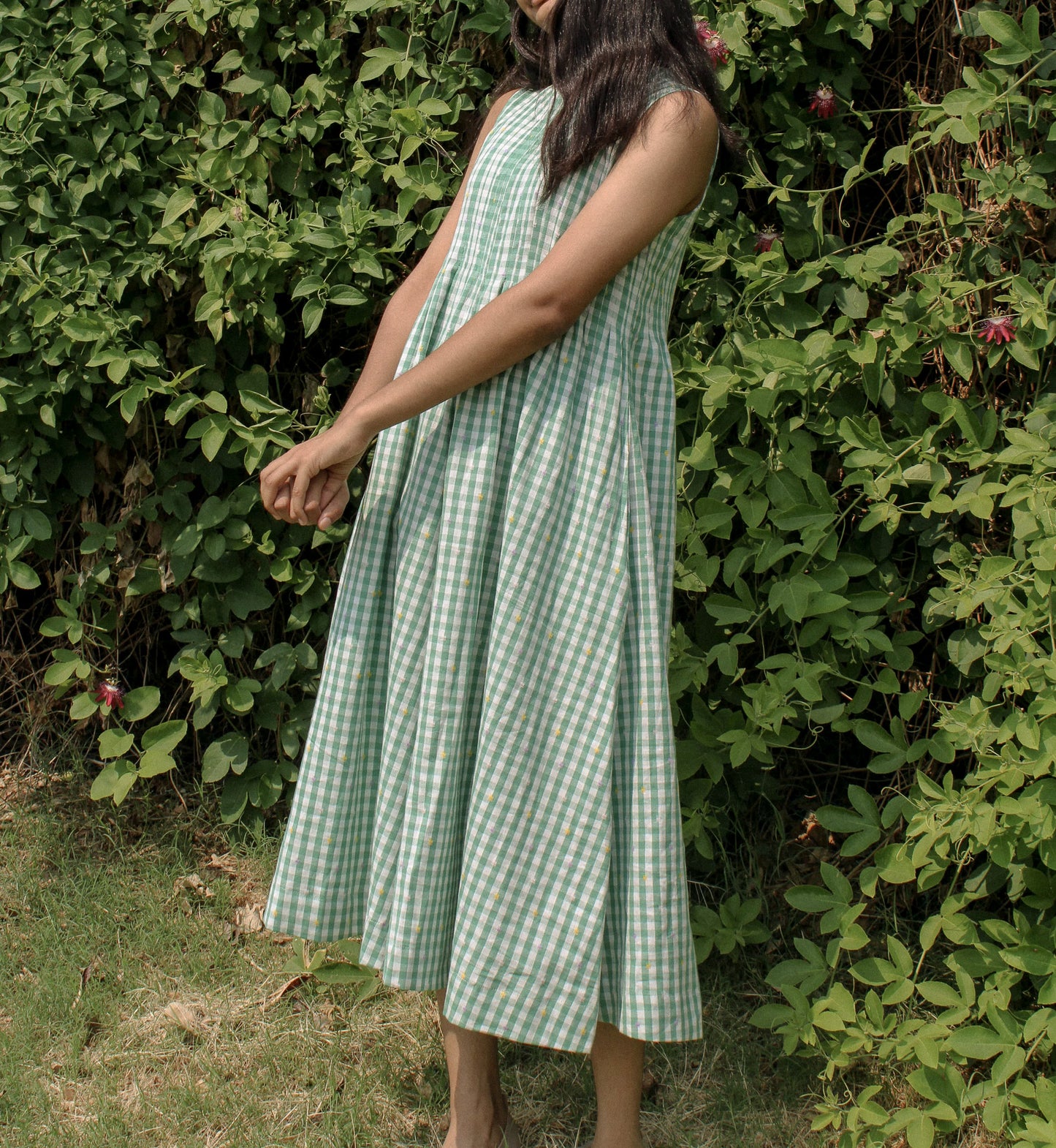 Side profile of Neva Midi Dress – harmony with nature