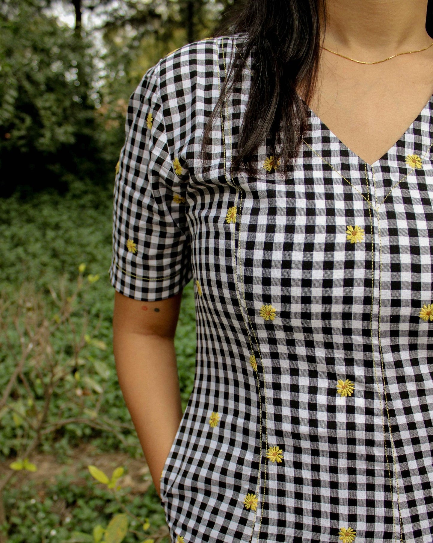 Close-up of gingham fabric texture on Vanya Midi Dress