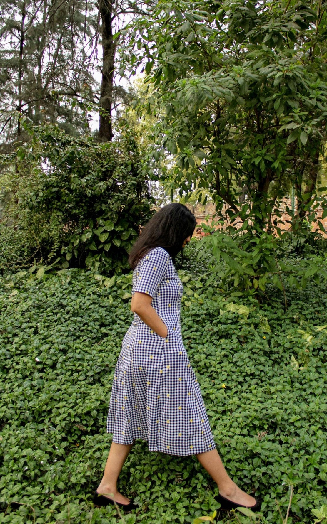Side profile of Vanya Midi Dress in classic gingham print
