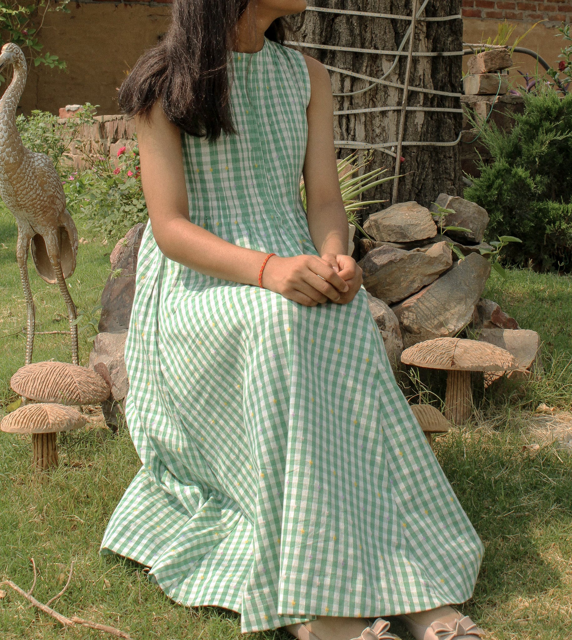 Natural fabric of Neva Midi Dress glowing in golden hour light