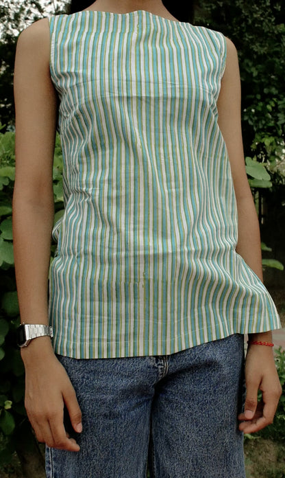 Model wearing the Nirv Blouse in natural light – soft, elegant movement