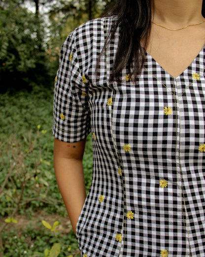 Close-up of gingham fabric texture on Vanya Midi Dress